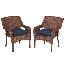 Hampton Bay Cambridge Brown Wicker Outdoor Patio Dining Chair With Standard Midnight Navy Blue Cushions 2 Pack 65 7148b2 The Home Depot Patio Dining Chairs Wicker Dining Chairs Patio Furniture Replacement Cushions