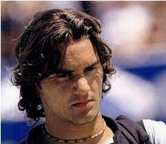 A young federer on the beach in 2000. The Evolution Of Roger Federer S Hair In Pictures Sports Illustrated