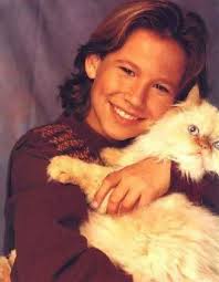 23 Photos Of Jonathan Taylor Thomas Holding Things