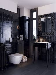 Black And White Tile Powder Room The Sleek Detailed Black Tile Walls Make For A Powder Room That Is Glamorous And Luxurious Yet Black Tile Bathrooms European Bathroom Design Bathroom Design