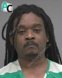 Man charged with attempted murder after allegedly shooting at neighbor's  apartment