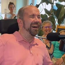 Computer that can 'read the mind' helps man with motor neurone disease  'speak' again as family burst in tears