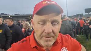 Greencastle Captain Conor Carson enjoys the feeling of promotion and  winning division 2