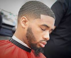 The short wavy haircut is fashionable for black men. Black Men Wave Haircut Novocom Top