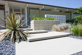 Gardens were to be lived in, not looked at. 25 Garden Designs For Midcentury Modern Homes