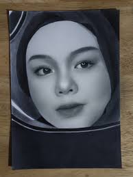 Inking up a collagraph Elinor Brooks