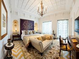 Two chairs are in front of the bed to add dimension. World S Most Luxurious Bedrooms