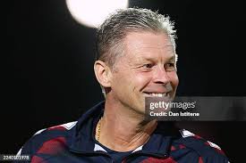 Lee Angol of Cheltenham Town battles for the ball with Dan Ellison of...  News Photo