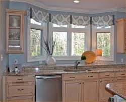 White kitchen window treatment to emphasize black countertop 5 Curtain Ideas For Bay Windows Curtains Up Blog Kwik Hang