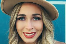 A close up of a person wearing a hat photo