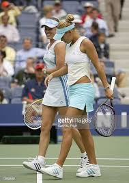 Martina Hingis And Anna Kounikova Of Russia Walks To The Baseline While Playing Tatiana Perebiynis Of The Ukraine And Tati Martina Hingis Sport Frauen Sportler