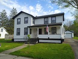 New color over mismatched vinyl siding.