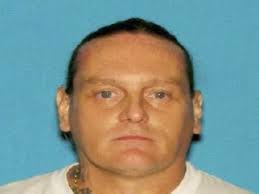 Ross Elliott's body found in car with gunshot wound after woman saw hand  hanging from trunk