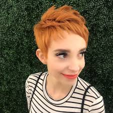 The cutest little red headed pixie I ever did see @ren.thepixie and bonus,  she's a fellow hairstylist. Scroll through to see the up vs down pixie  styling. Ask Ren @ren.thepixie for her