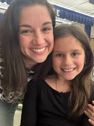 Sitting in a lunchroom about to watch my little girl represent her grade in  the schoolwide spelling bee. Y'all, it might as well be NCAA national  championship up in here, I am