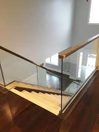 Glass Railing System Furnished Installed By Rex Glass Mirror Co Inc Stair Railing Design Railing Design Wrought Iron Stair Railing