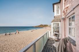 In one of the district's finest locations standing high above hain walk between carbis bay and porthminster beaches; Tour Alba Beach House In St Ives Cornwall A Pink Cob Cottage