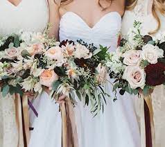 See more ideas about flower arrangements, floral arrangements, arrangement. The Bridesmaids Will Carry Average Sized Round Bouquets Of White Hydrangeas Blue Succulents Wine Col Wedding Bouquet Champagne Mauve Wedding Wedding Flowers