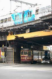 A Tram And A Train Corner Of Flinders And Spenser Streets Melbourne Melbourne Best Cities Street