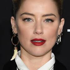 Amber Heard discusses coming out as bisexual to religious family: 'It was  just tears'