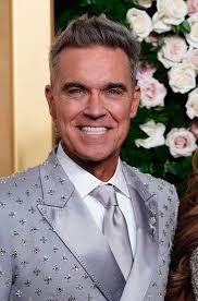 Robbie Williams Fanfest added a...