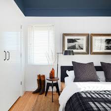 Boldly colored walls look crisp and sharp, and the ceiling feels higher. Ceiling The Design Tabloid
