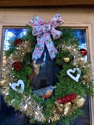I applied the berries to his wreath one by one. Robin In Wreath Ultimate Paper Mache
