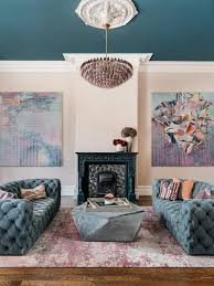 Teal walls combine beautifully with a mustard sofa and rug for a warm scheme. Best Ways To Use Teal In Your Living Room Hgtv