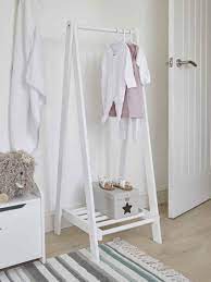 This clothing rack will look great in your child's bedroom. White Wooden Clothes Rail Wooden Clothes Rail Clothes Rack Wooden Clothes Rack Kids Clothes Storage Clothes Rail