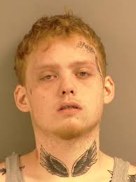 MAN ARRESTED FOLLOWING...