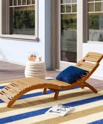 These lounge chairs and chases are perfect for relaxing and enjoying your outdoor living space all summer long. Tifany Wood Outdoor Chaise Lounge Furwoodd