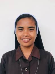 Sisters Kathy Farrelly and Laura Melancon enjoy Santa and a sleigh ride in  Lafayette, LA.