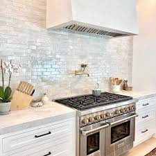 Contemporary kitchen design with brown kitchen cabinets. In Stock Zellige Handmade Moroccan Zellige Tiles Zia Tile In 2021 Kitchen Backsplash Designs Home Decor Kitchen Kitchen Design