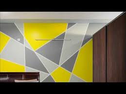You can separate different colours with strips which can. Painting Geometric Triangle Accent Wall Pattern Aapkapainter At Trifecta Starlight Bangalore Youtube Wall Patterns Wall Paint Designs Wall Paint Patterns