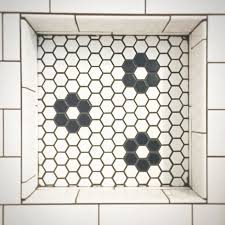 Black And White Hexagon Floor Tile Flower Hex Matte White W Black Flower Porcelain Wall And Floor Tile The Tile Shop Wall And Floor Tiles White Hexagon Tiles Tile Floor