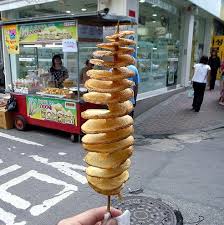 New shop selling all types of flavoured spiral potatoes. Spiral Cut Fried Whole Potato Korean Junk Food Boing Boing