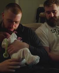 Stepping away from my regular content to feature Travis Kelce holding his  newborn niece like a football. #TravisKelce #JasonKelce Because it’s  adorable. 🏈👨🏻‍🍼