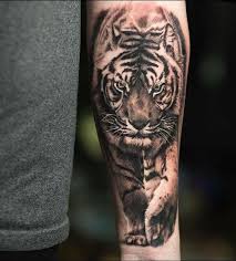 Maybe you would like to learn more about one of these? Lone Tiger Forearm Tattoo Mens Tiger Tattoo Animal Tattoos For Men Tiger Tattoo Design
