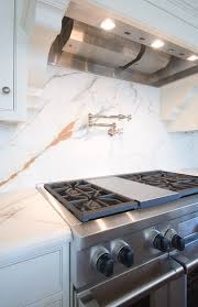 You can also incorporate other materials like ceramic tiles or hand poured glass. Calacatta Paonazzo Marble Full Height Backsplash Kitchen Marble Marble Kitchen Decor Carrera Marble Kitchen
