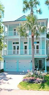 One color scheme that looks good whether you're in a woodsy area, a coastal town, or a prairie land is a combination of sage greens, dark browns, and coppery tones. Miami Home In Tiffany Blue By Lendry Homes Beach House Exterior Cottage Exterior Florida House Exterior