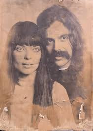 They are finally reunited in heaven. Can you make it look better. I'm going  to place this photo