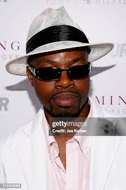 Stilt dancers Kae Burke and Ali Schmitz pose for a photo with Glamour...  News Photo