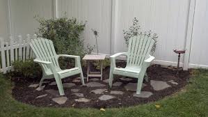 Small Garden Sitting Area With Bark Mulch And Flag Stones Backyard Sitting Areas Garden Sitting Areas Outdoor Sitting Area