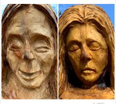 Chainsaw carver softens tree stump angel's face