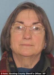 Woman gunned down in a triple murder last year had accused her killer just  minutes earlier of shooting her sister to death decades ago