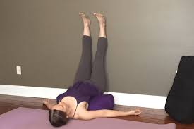 Lie down on your back, bend at the knees, and plant your feet on the ground. 10 Relaxing Ways To Use A Yoga Bolster Spoiled Yogi