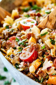 Up Close Of Cowboy Pasta Salad With Ground Beef Black Beans Corn Tomatoes And Barbecue Sauce In A Metal Bow Pasta Salad Pasta Salad Recipes Main Dish Salads
