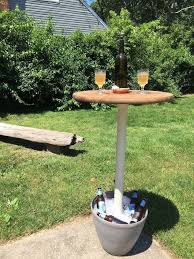 Made of acrylic and gold finished stainless steel, this accent table is both sturdy and stylish. Make An Outdoor Drink Pedestal Table Your Guests Will Love Hometalk