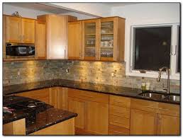 The color turquoise blends beautifully with honey oak cabinets and light gray countertops. Honey Oak Cabinets With Black Granite Shefalitayal