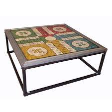 This coffee table features a transparent tempered glass top supported by a sleek steel frame, as well as a lower shelf for added storage space. Ludo Coffee Table Andrewmartin Game Coffee Table Games Coffee Table Coffe Table